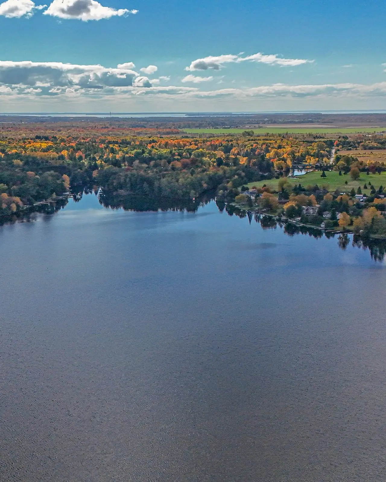 Autumn shoreline and docks on a Lake Country waterfront, Ontario